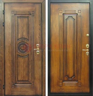 Коричневая металлическая дверь с массивом дуба с рисунком ДМД-10 в Гатчине