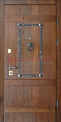 Темная стальная дверь с массивом дуба с ковкой ДМД-37 в Хотьково