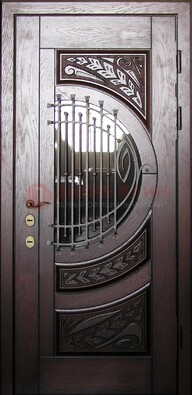 Одностворчатая входная дверь со стеклом и ковкой ДСК-21 в Хотьково