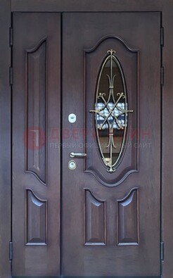 Темная металлическая дверь Винорит со стеклом и ковкой ДСК-239 в Хотьково